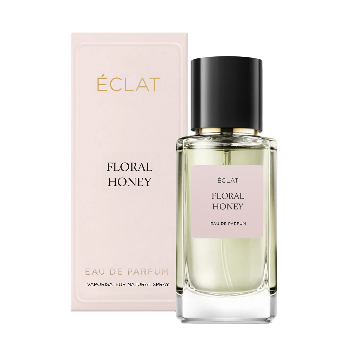 ÉCLAT FLORAL HONEY Eau de Parfum in einem klaren Glasflakon mit schwarzem Verschluss, neben einer hellrosa Verpackungsbox.