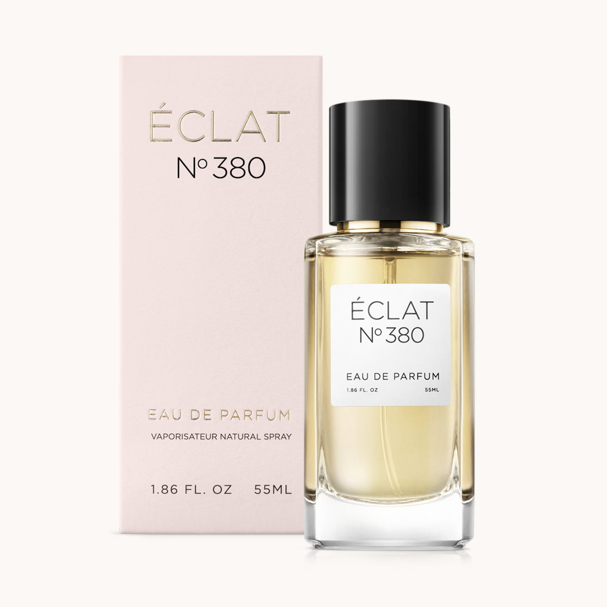 ÉCLAT No. 380 perfume bottle with matching light pink packaging. The elegant glass flacon features a black cylindrical magnetic cap and a simple white label with the inscription ÉCLAT No. 380 and “Eau de Parfum”.