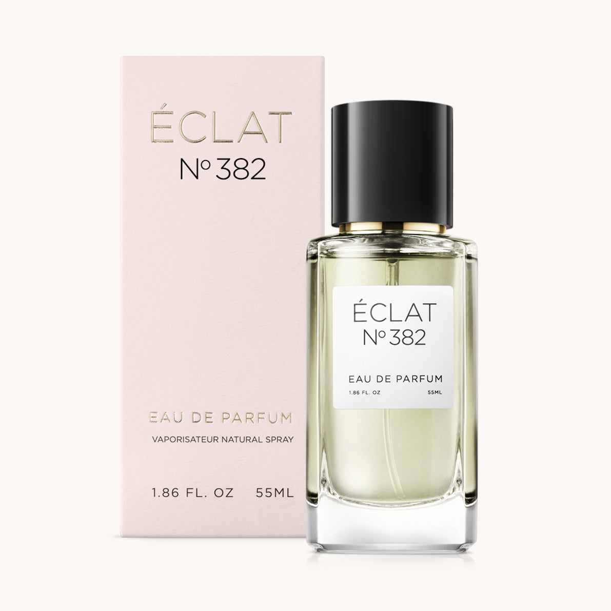 ÉCLAT No. 382 perfume bottle with matching light pink packaging. The elegant glass flacon features a black cylindrical magnetic cap and a simple white label with the inscription ÉCLAT No. 382 and “Eau de Parfum”.