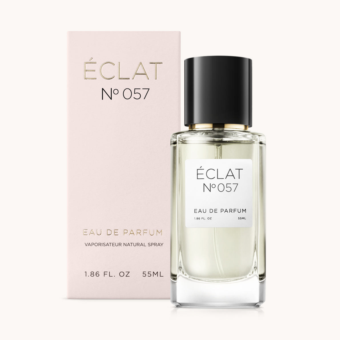 ÉCLAT No. 057 perfume bottle with matching light pink packaging. The elegant glass flacon features a black cylindrical magnetic cap and a simple white label with the inscription ÉCLAT No. 057 and “Eau de Parfum”.