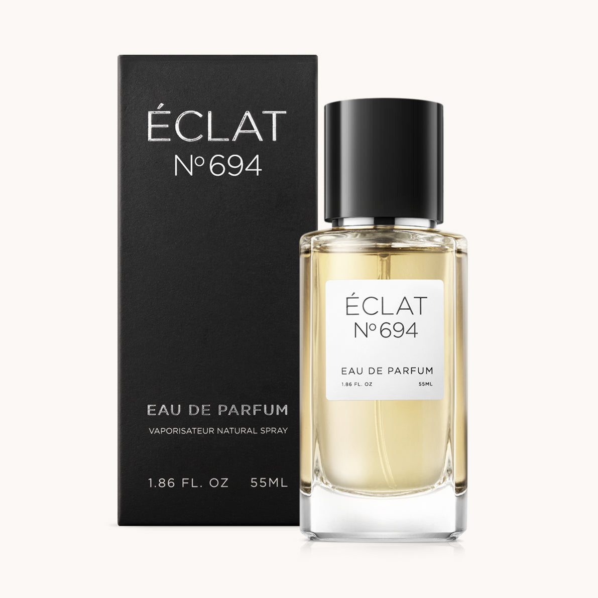 ÉCLAT No. 694 men’s perfume bottle with matching black packaging. The elegant flacon features a black cylindrical magnetic cap and a clean white label with the inscription ÉCLAT No. 694 and “Eau de Parfum”.