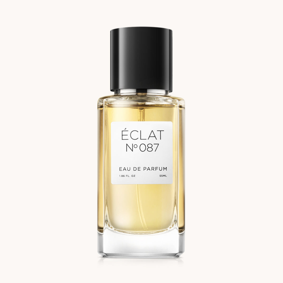 Flacon of the women's perfume dupe ÉCLAT No. 087 RAR, an elegant transparent glass bottle with a black cylindrical magnetic cap and a white label. The label features the brand name ÉCLAT, the number 087 RAR, and the words “Eau de Parfum”.