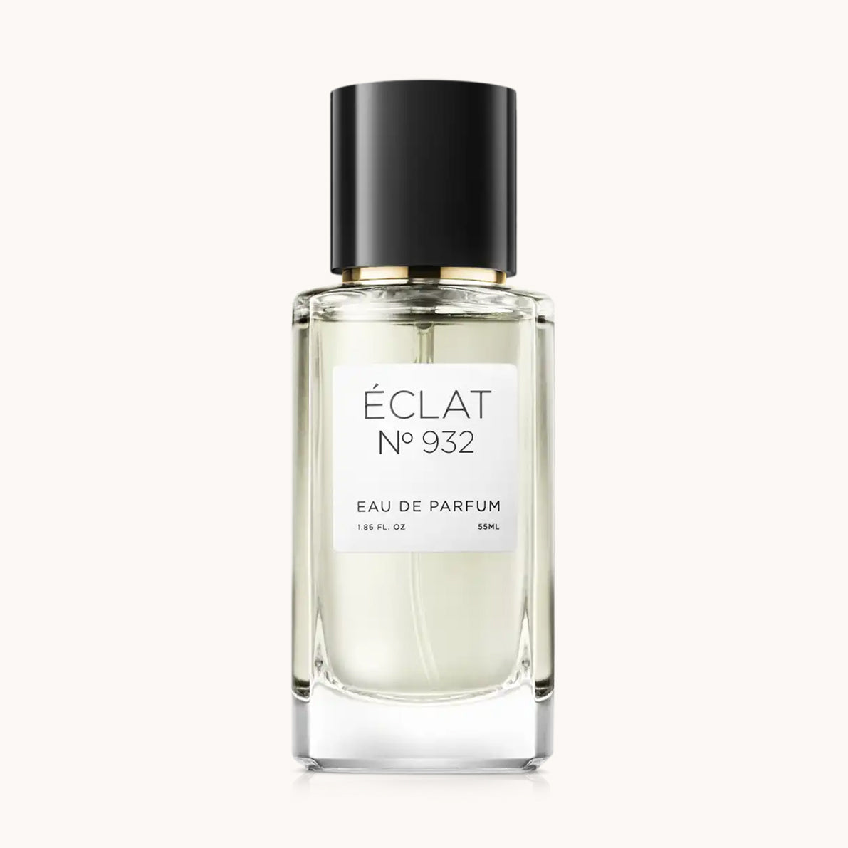 Flacon of the unisex perfume dupe ÉCLAT No. 932 VIP, an elegant transparent glass bottle with a black cylindrical magnetic cap and a minimalist white label. The label displays the brand name ÉCLAT, the number 932 VIP, and the phrase “Eau de Parfum”.