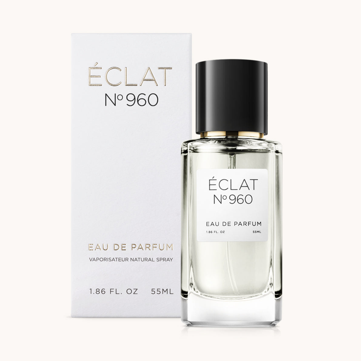 ÉCLAT No. 960 unisex perfume bottle with matching very light grey packaging. The elegant flacon features a black cylindrical magnetic cap and a clean white label with the inscription ÉCLAT No. 960 and “Eau de Parfum”.