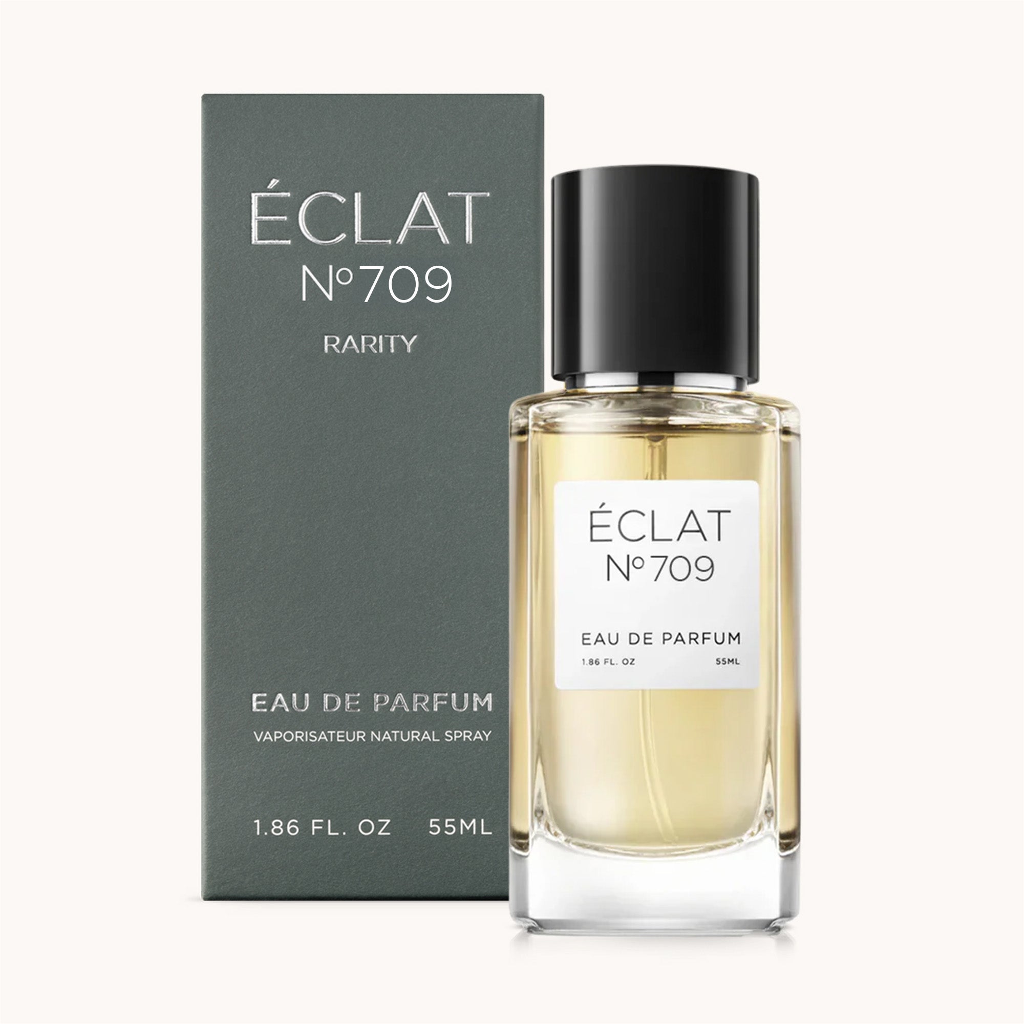 ÉCLAT Black Tea & Cedar Eau de Parfum mit facettiertem Glasflakon und schwarzer Verschlusskappe, neben einer eleganten dunkelgrünen Box.