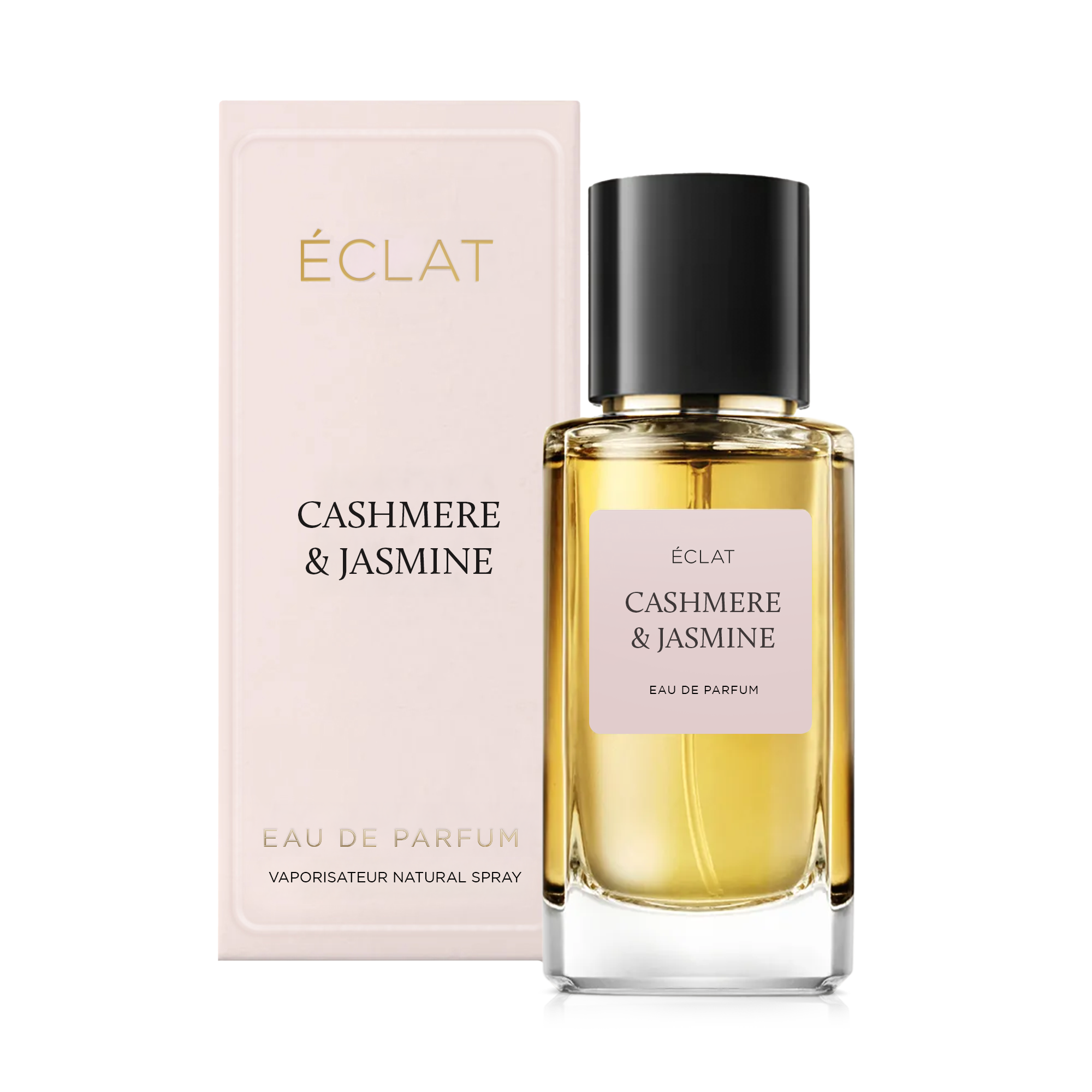 Facettierter Glasflakon mit sanft rosa Etikett und schwarzer Kappe neben edler Box mit ÉCLAT Cashmere & Jasmine.