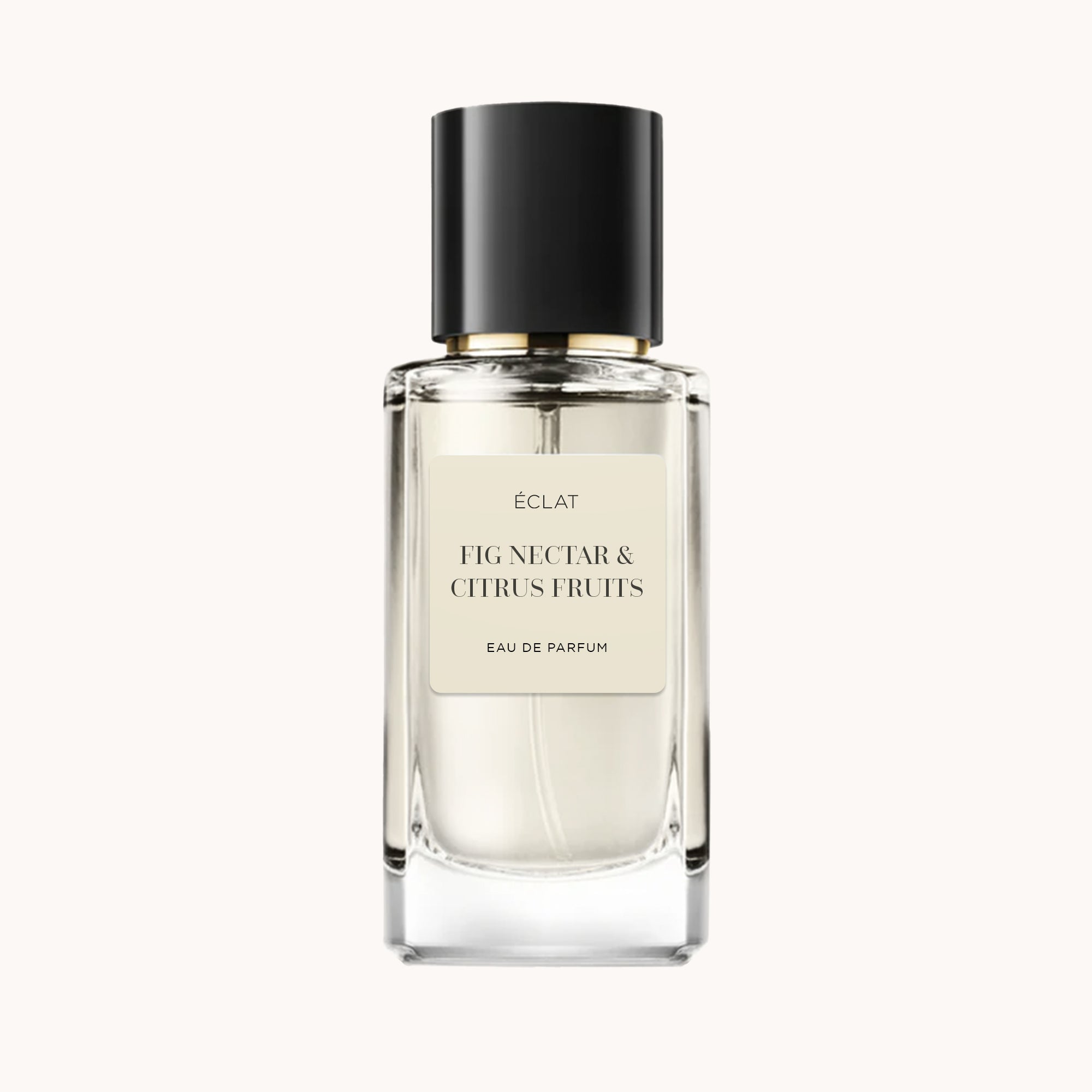 Eleganter Glasflakon von ÉCLAT Fig Nectar & Citrus Fruits mit schwarzem Verschluss und softem beigen Etikett.