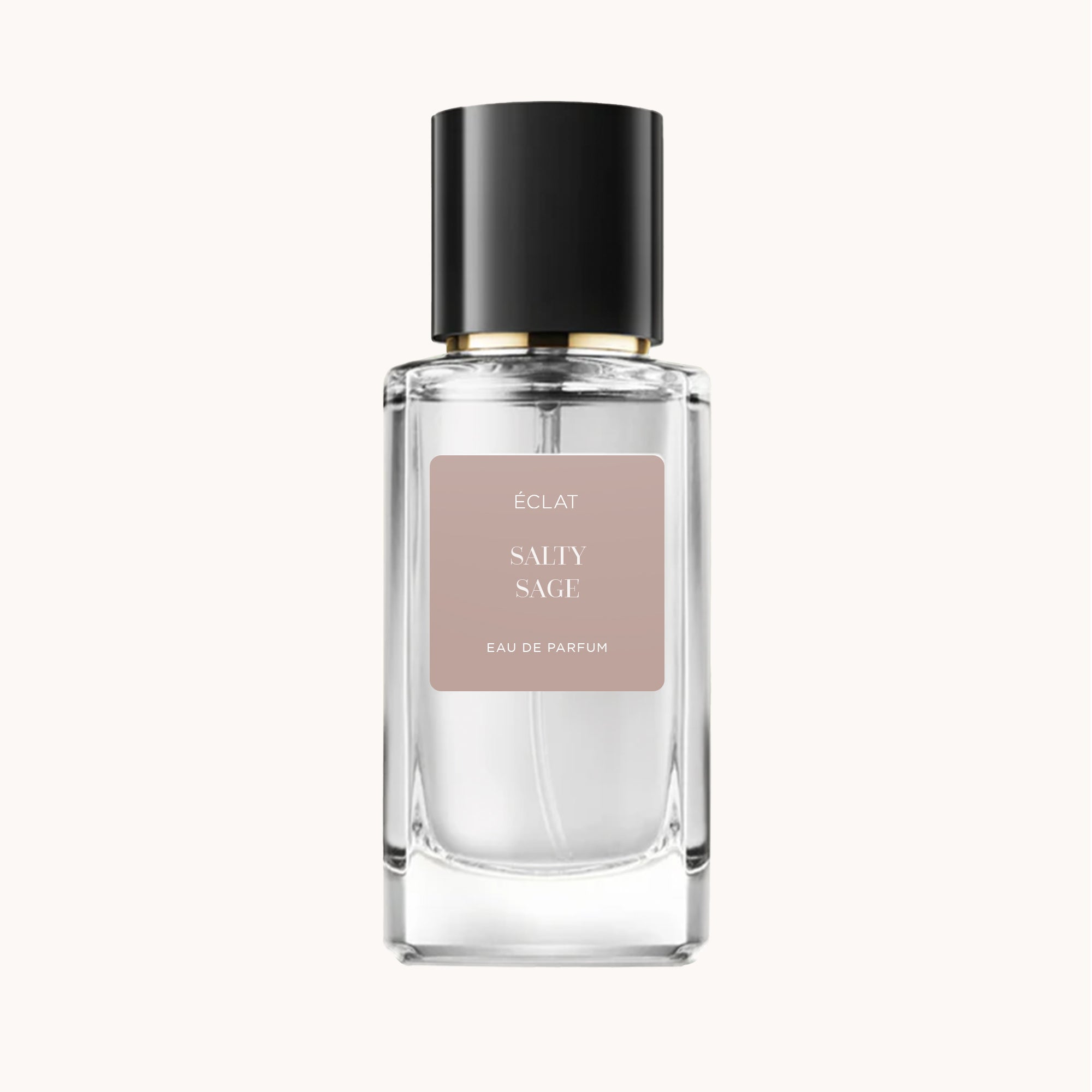 Ein klarer facettierter Glasflakon von ÉCLAT Salty Sage mit schwarzem Verschluss und beigem Etikett.