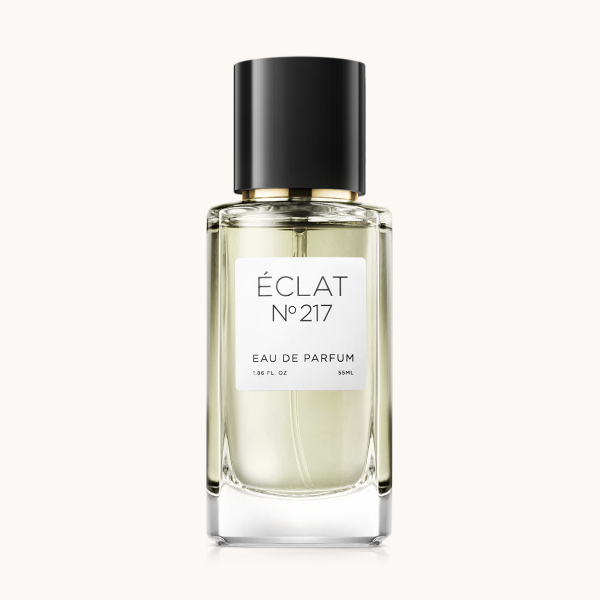 ÉCLAT Floral Honey Parfumflakon mit klarem facettiertem Glasdesign und schwarzem Verschluss.