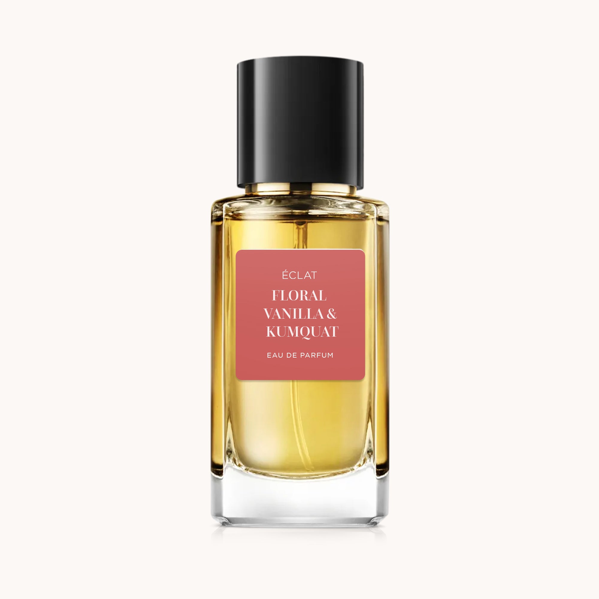 ÉCLAT Floral Vanilla & Kumquat in einem facettierten Glasflakon mit schwarzem Verschluss und satiniertem Etikett.