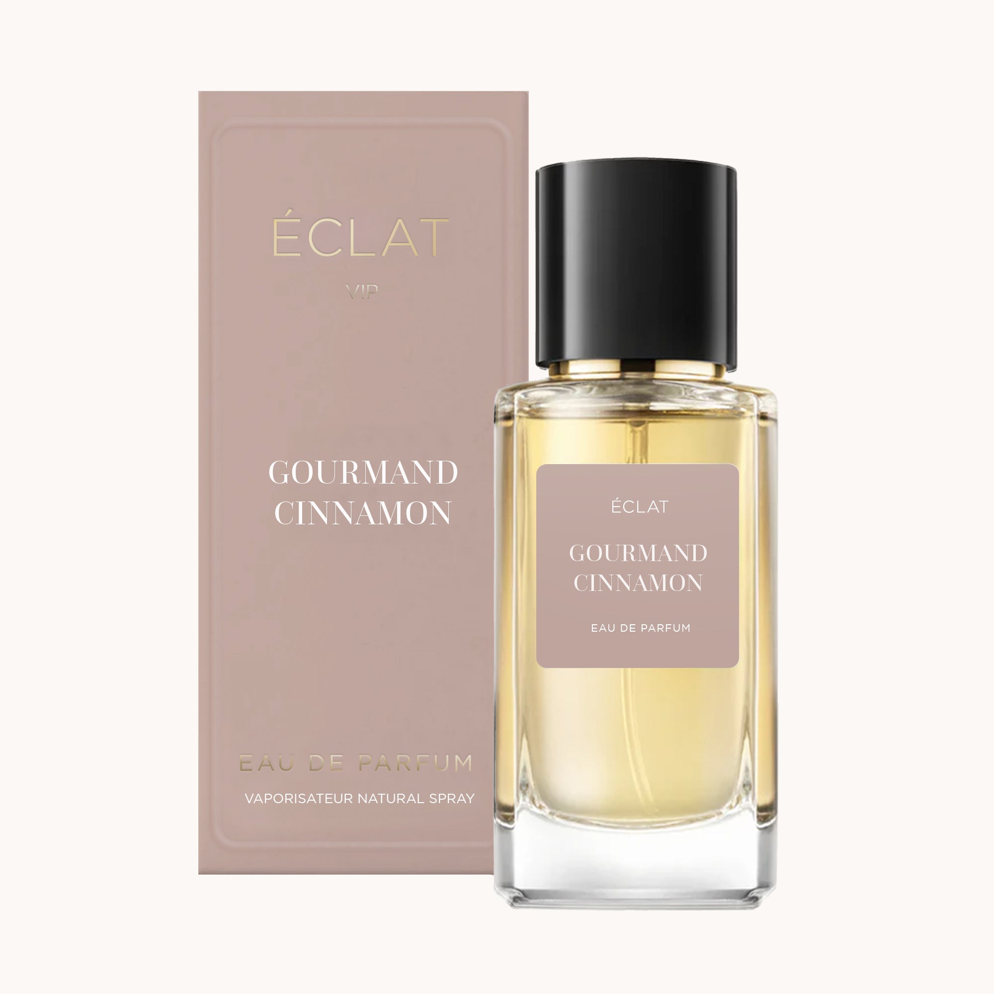 ÉCLAT Gourmand Cinnamon Duftflakon mit quadratischem Glasdesign und schwarzem Verschluss neben einer eleganten taupefarbenen Schachtel.