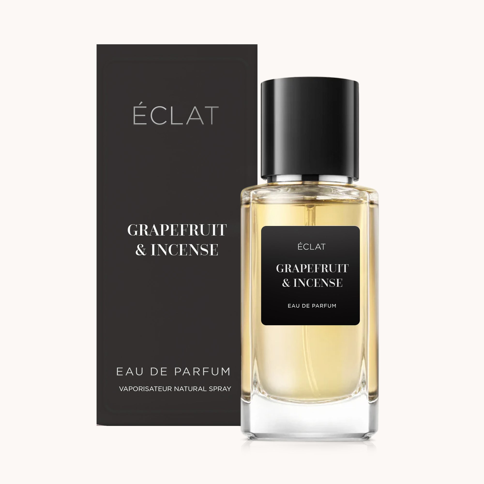 ÉCLAT Grapefruit & Incense Parfümflakon mit schwarzer Kappe und passender Box.