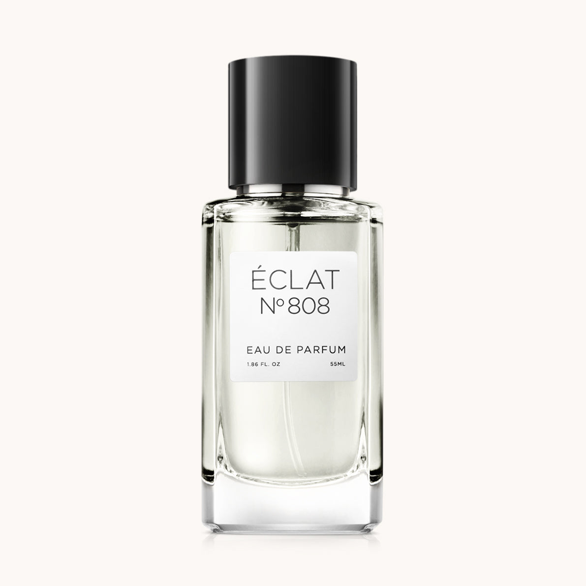 ÉCLAT Juniper Berry & Blood Orange in einem facettierten Glasflakon mit eleganter schwarzer Kappe.