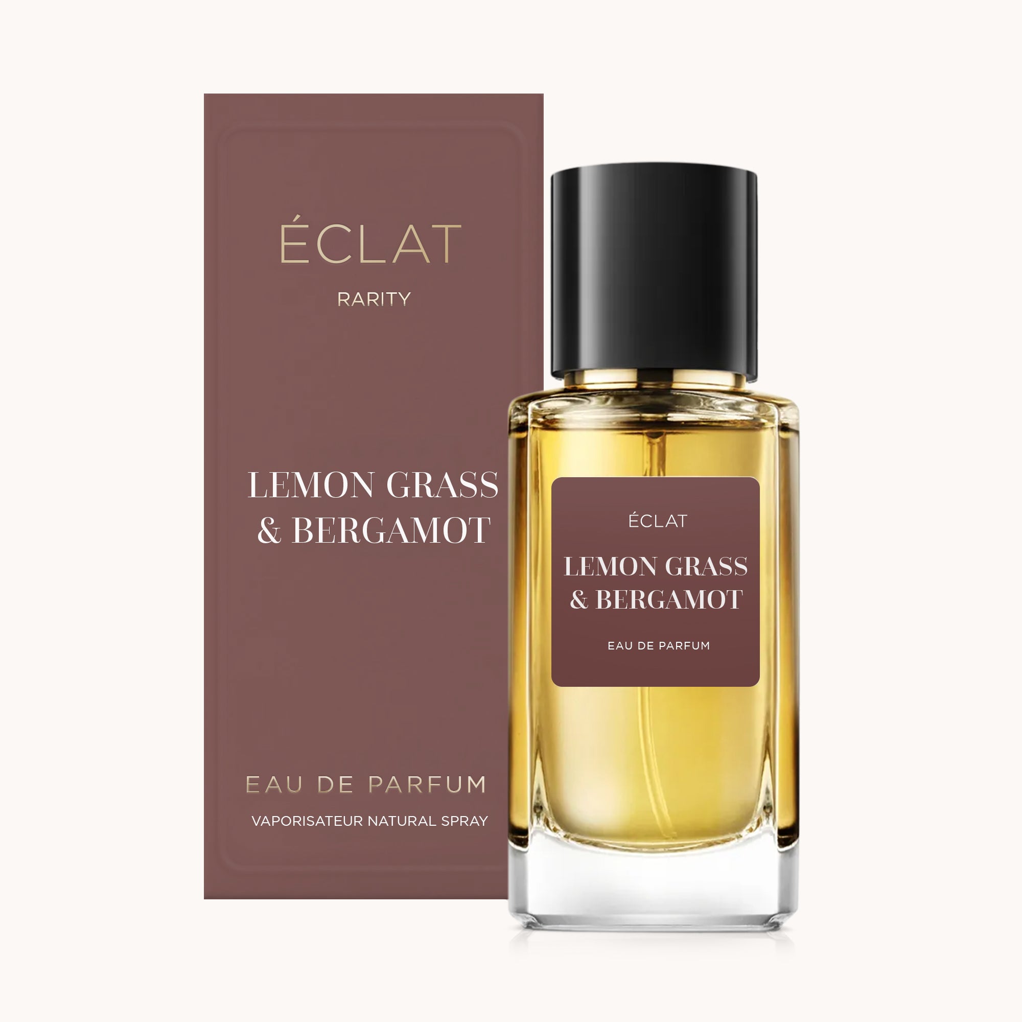 Der ÉCLAT Lemon Grass & Bergamot RAR präsentiert sich in einem facettierten Glasflakon mit schwarzem Verschluss und einer passenden eleganten Verpackung in tiefen Brauntönen.