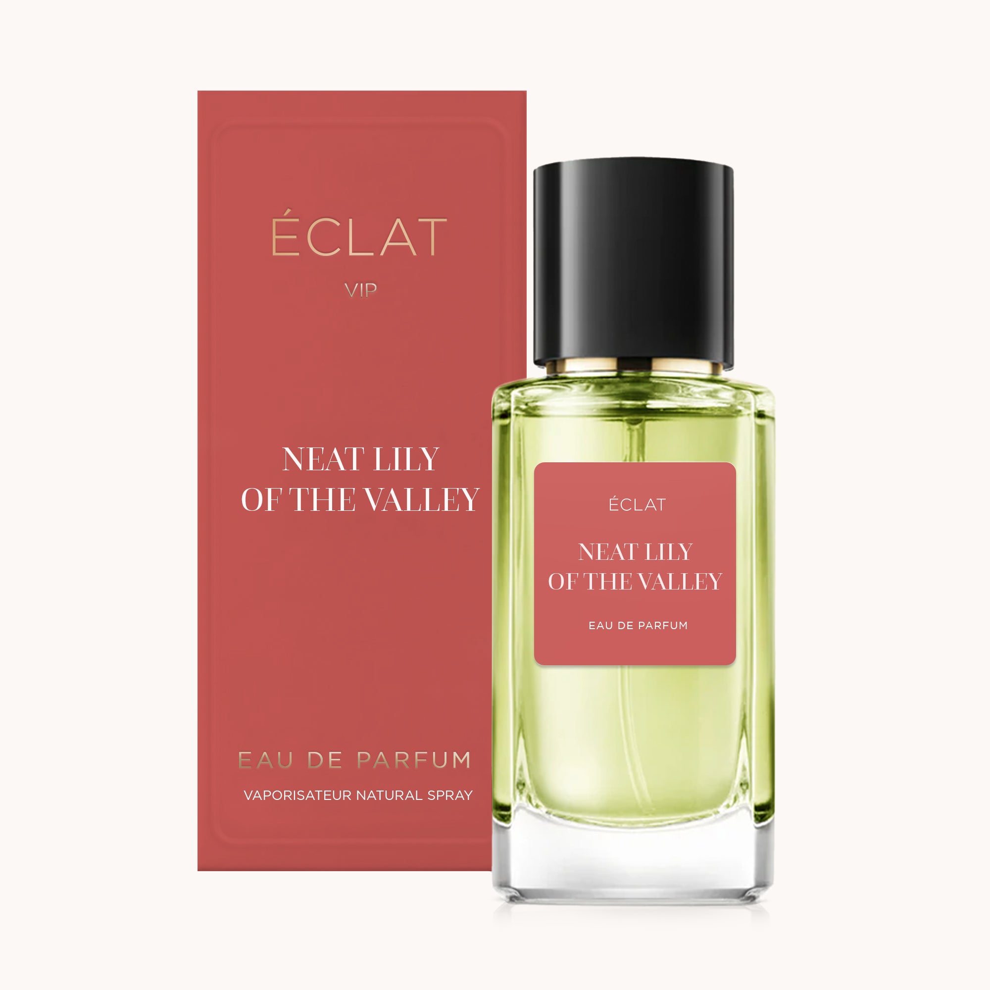 Der ÉCLAT Neat Lily of the Valley VIP Parfumflakon mit transparentem Glasflakon und schwarzem Verschluss ist neben seiner eleganten roten Verpackung zu sehen.