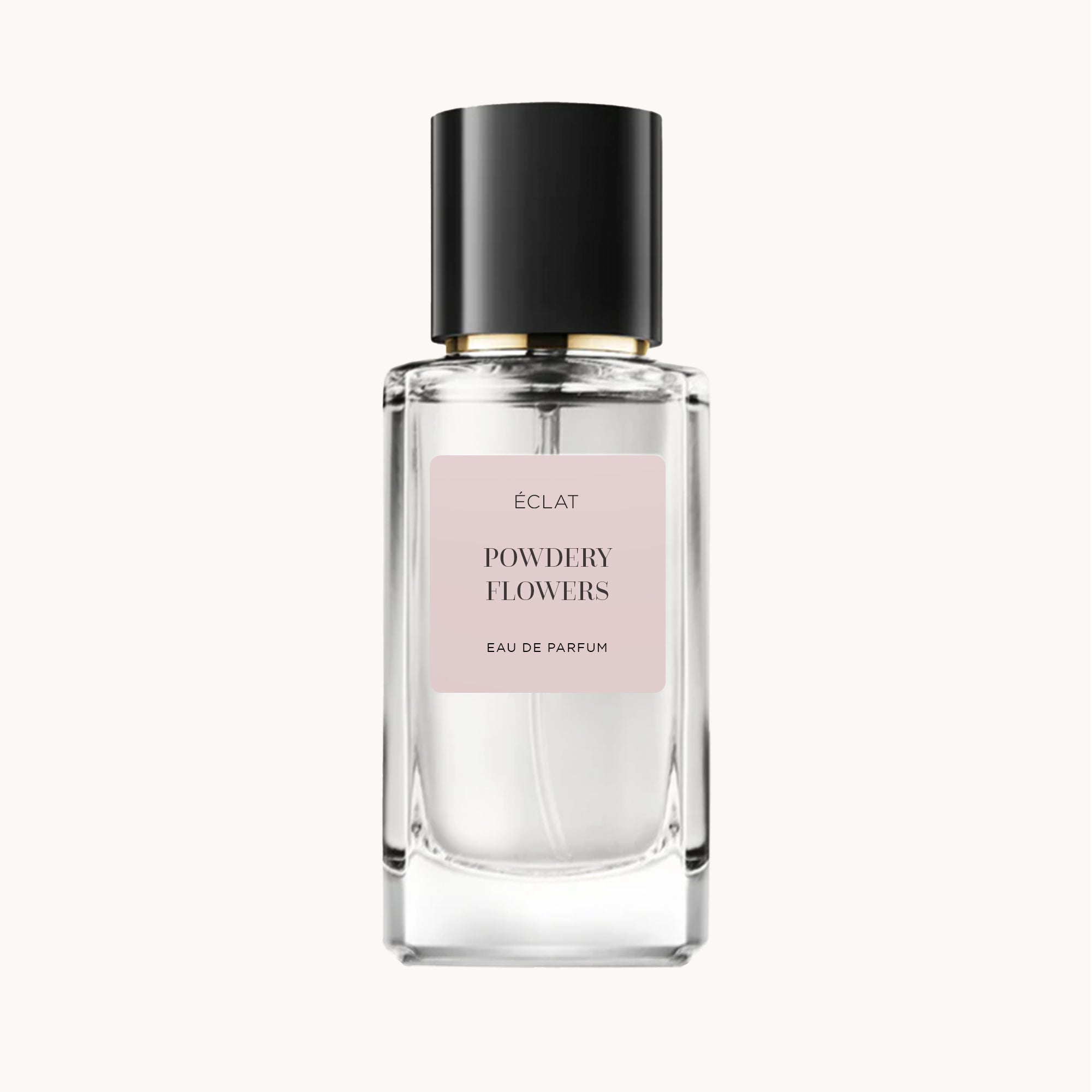 ÉCLAT Powdery Flowers in einem klaren Glasflakon mit schwarzem Verschluss und rosa Etikett.