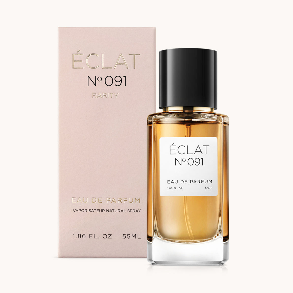 ÉCLAT Sweet Amaretto Parfümflakon mit schwarzer Kappe und einer blassrosa Schachtel daneben.
