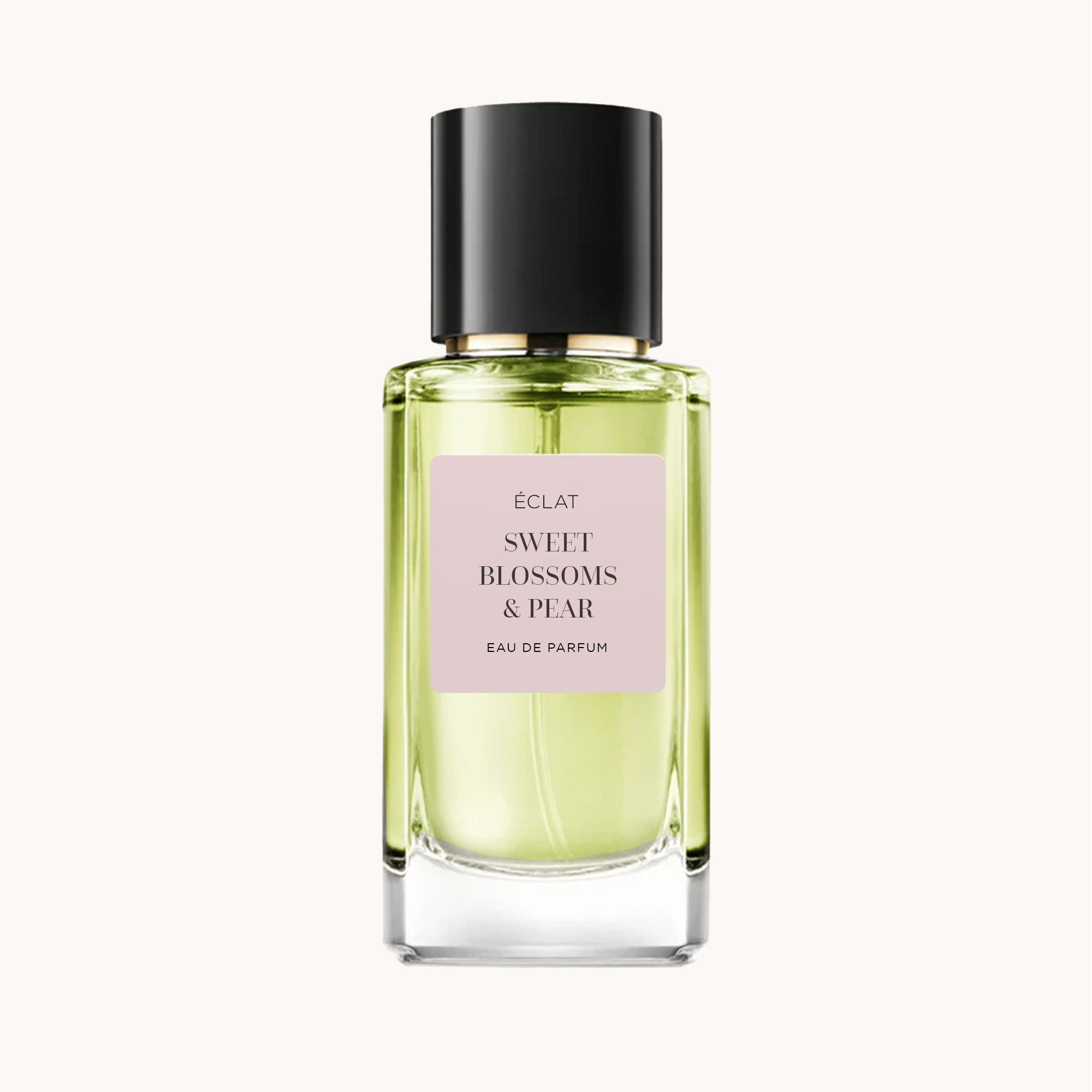 Facettierter Glasflakon mit einem rosafarbenen Etikett und schwarzem Verschluss für ÉCLAT Sweet Blossoms & Pear.
