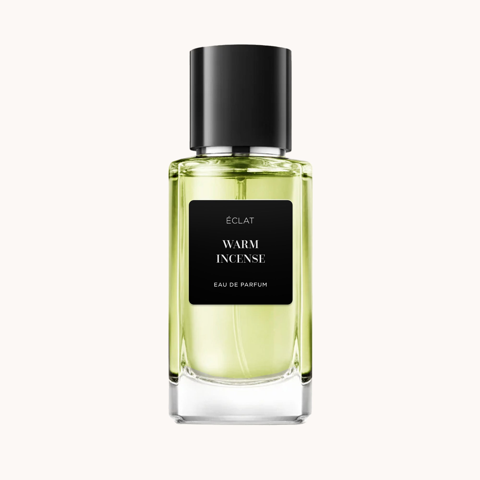 Facettierter Glasflakon mit schwarzem Etikett und Verschluss, zeigt ÉCLAT Warm Incense Eau de Parfum.
