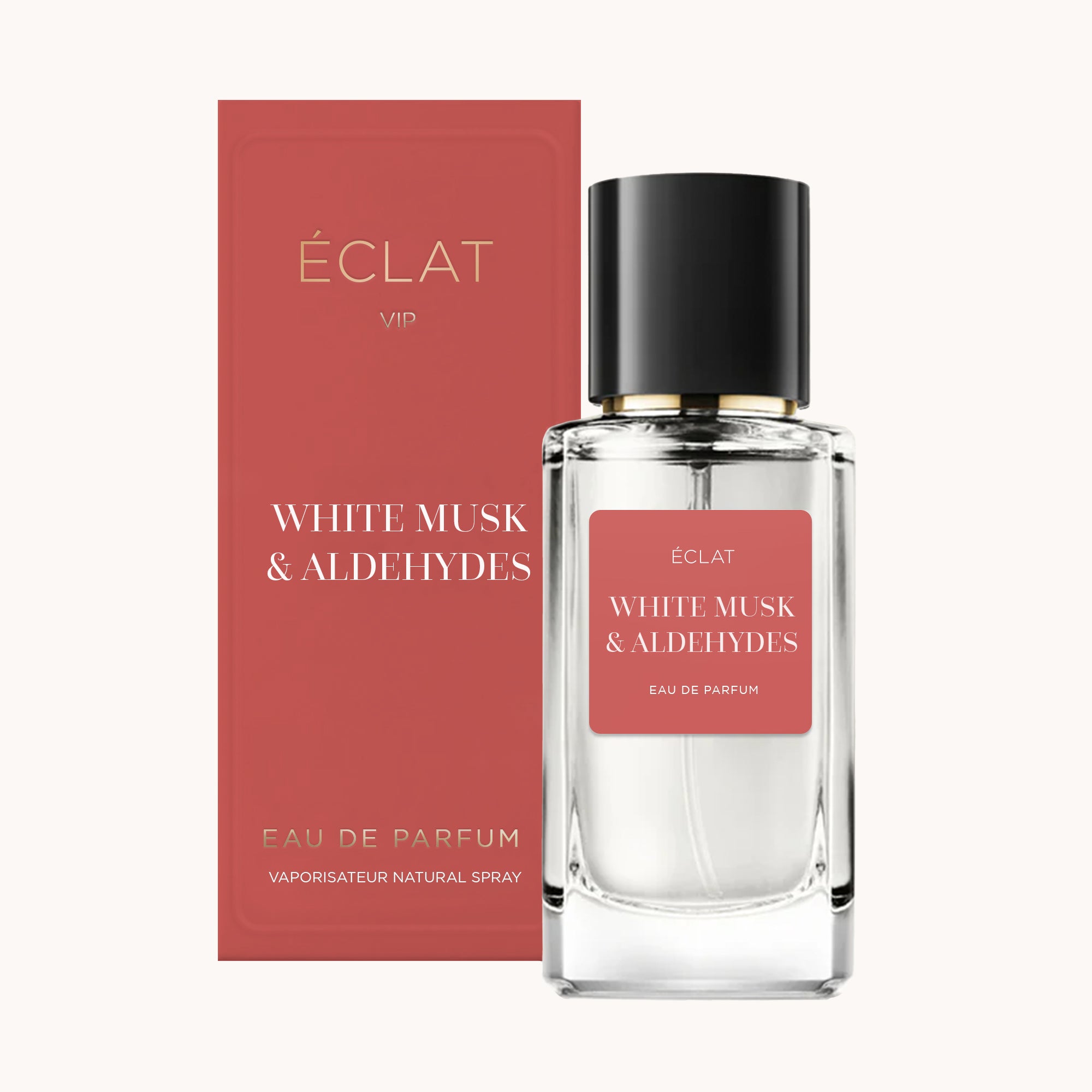 Eleganter Glasflakon von ÉCLAT White Musk & Aldehydes mit schwarzer Kappe, neben einer roten Schachtel mit goldenen Akzenten.
